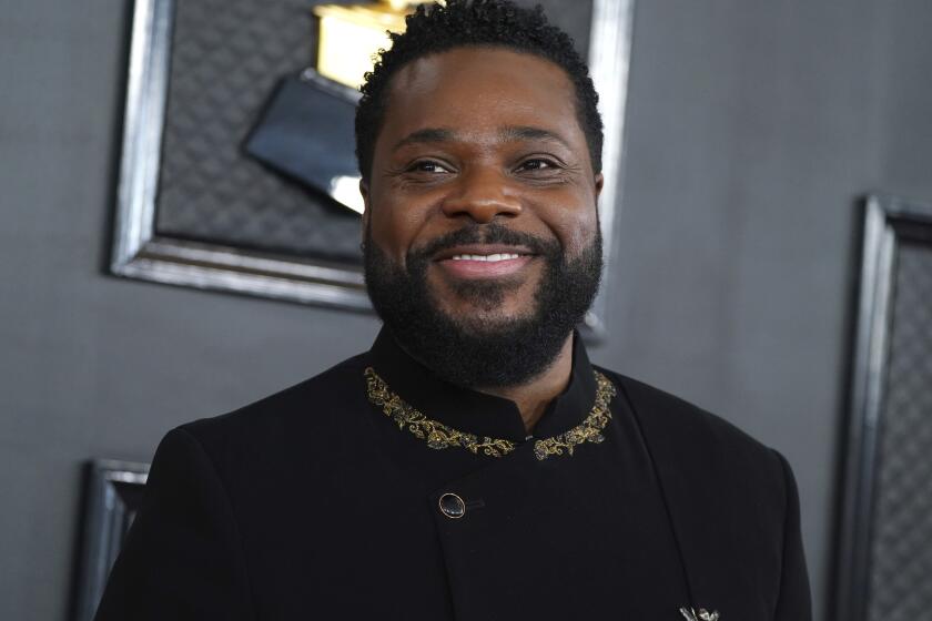 A year after Malcolm-Jamal Warner's death, widow Tenisha Warner sues actor's mother for $1.2 million