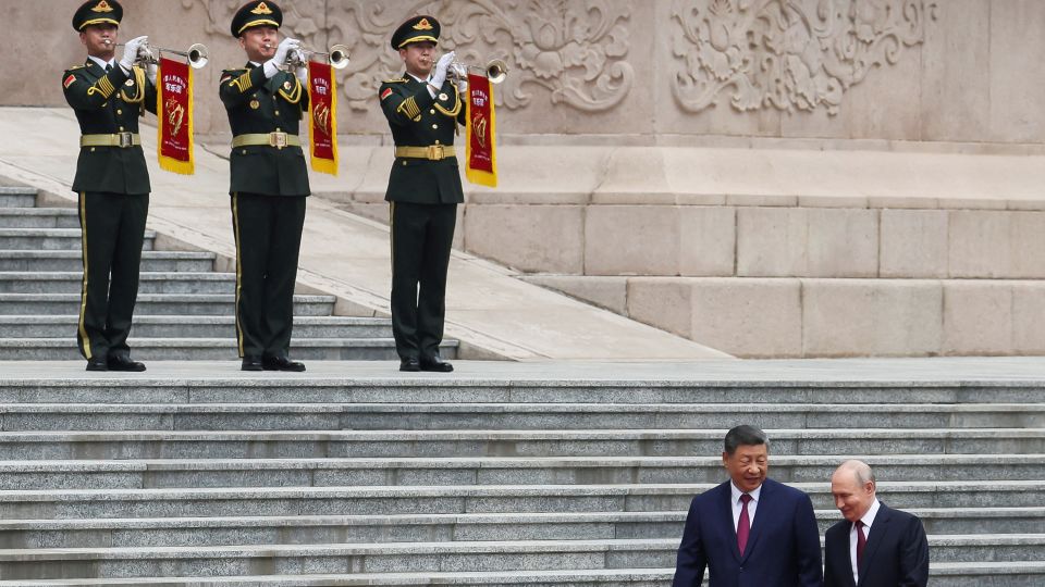 Russian President Vladimir Putin and Chinese President Xi Jinping attend a welcoming ceremony at the Great Hall of the People in Beijing, on May 20. - Maxim Shemetov/Reuters