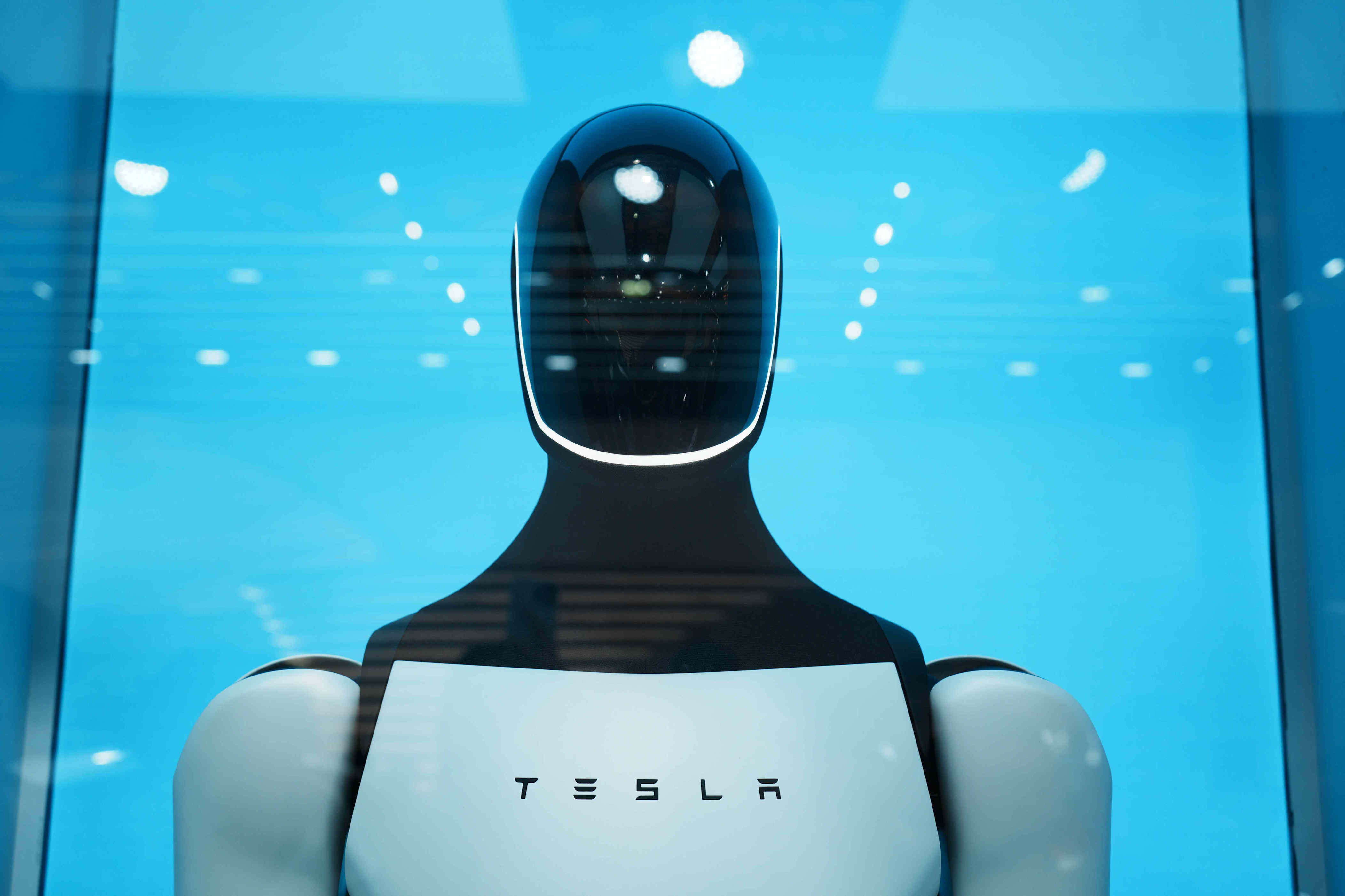 Big tech earnings live: Alphabet tops Wall Street expectations; Tesla profit misses estimates as spending soars