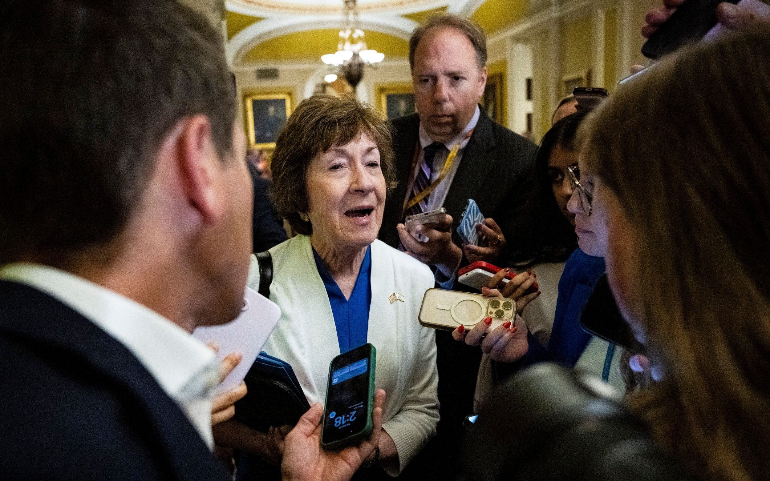 Ms Collins speaks to media during a Senate vote