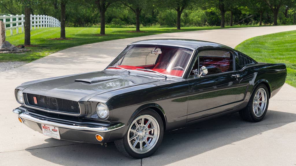 Coyote-powered 1965 Ford Mustang fastback for sale with 76 miles on the build