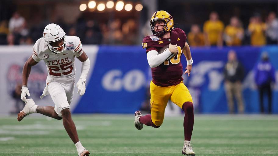 Sam Leavitt runs the ball against Texas in the 2024 Peach Bowl