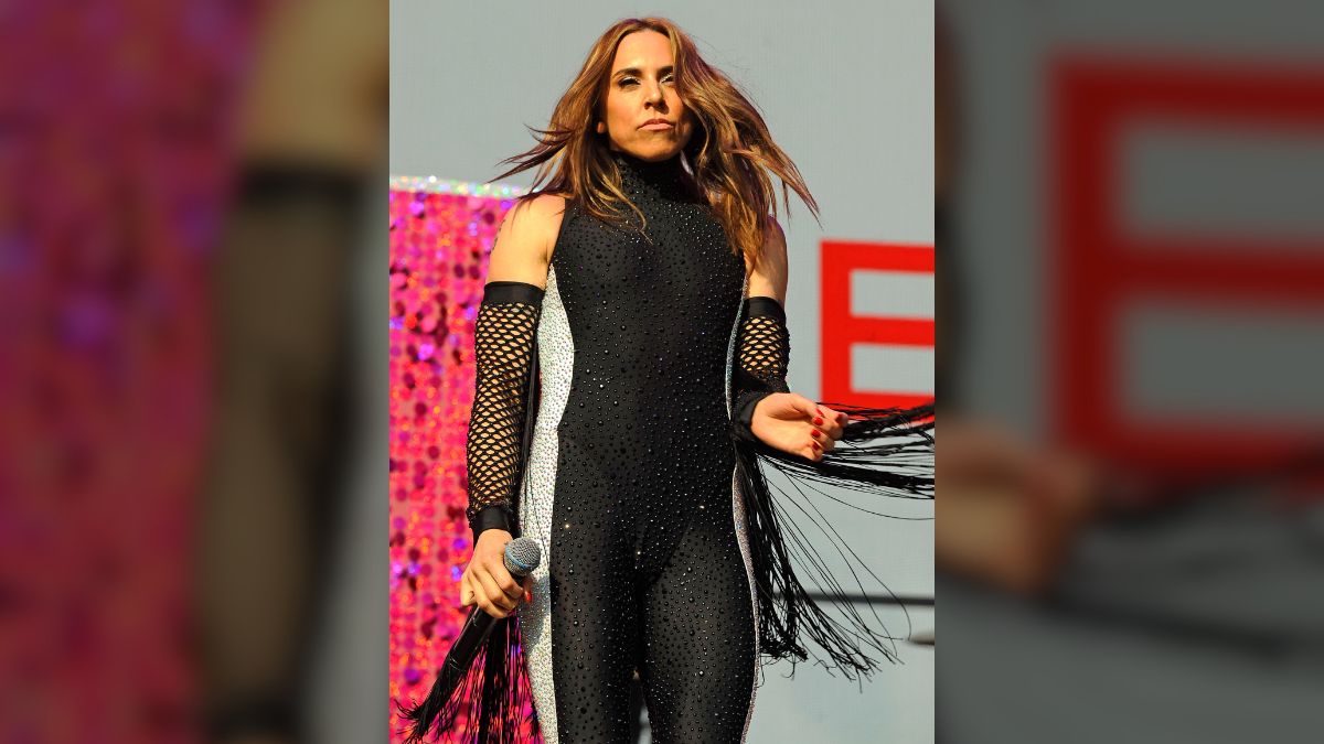 Newlywed Mel C tosses wedding bouquet to screaming fans on Ibiza dance floor