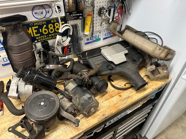Corvette parts on workbench