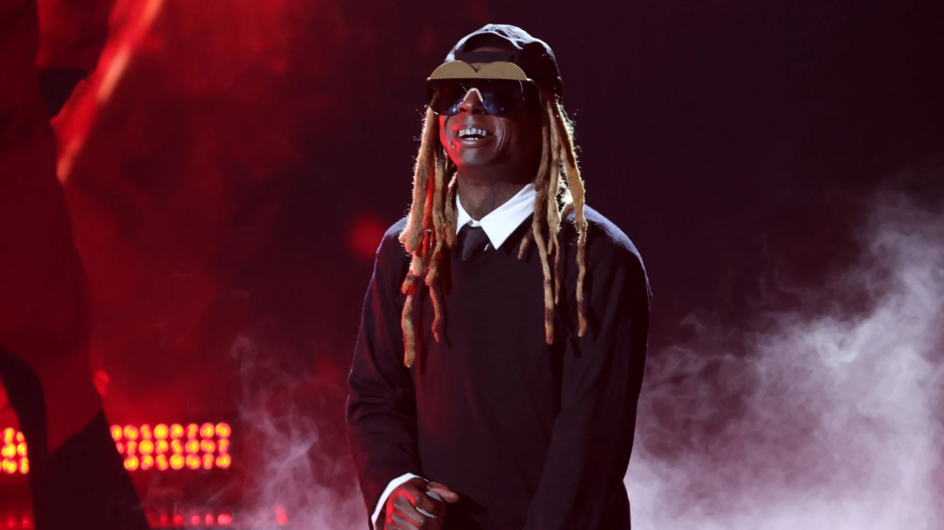 Lil Wayne says he was 14 when mom asked him and girlfriend to have a baby after his dad was killed