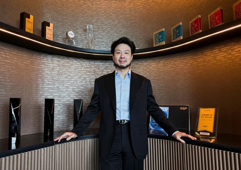Analysis-Asia's rich swap sponsorships for stakes in sports as dealmaking hits record