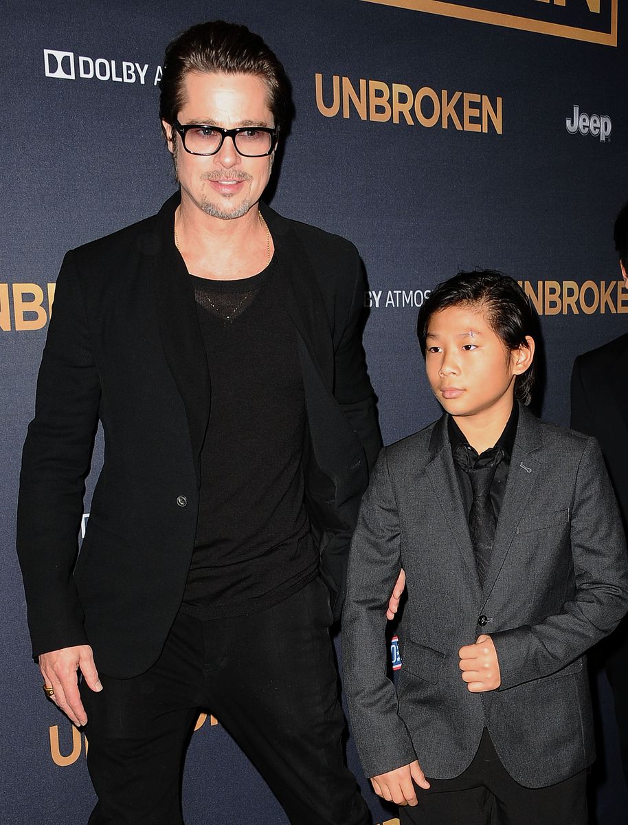 HOLLYWOOD, CA - DECEMBER 15: Actor Brad Pitt and Pax Thien Jolie-Pitt attend the premiere of