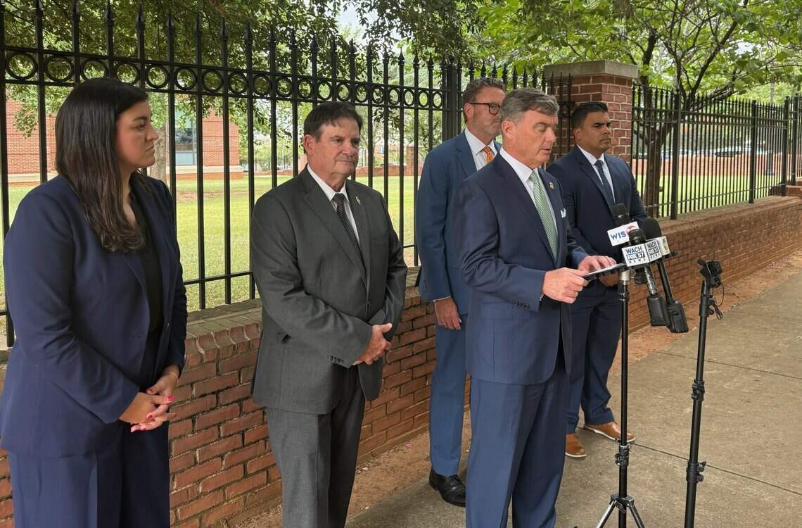 Assistant U.S. Attorney Samantha Usher, from left, South Carolina Department of Corrections Director Joel Anderson, U.S. Attorney for South Carolina Bryan Stirling, Assistant U.S. Attorney Lance Crick and FBI special Agent José Charriez speak at a news conference after prison guard Lowanda Atkinson pleaded guilty of wire fraud conspiracy on Wednesday, July 22, 2026, at the federal courthouse in Columbia, S.C.