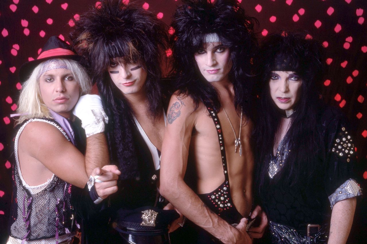 Vince Neil, Nikki Sixx, Tommy Lee, and Mick Mars of Motley Crue pose for a studio portrait at the Joe Louis Arena during the Theater of Pain tour, on September 15, 1985, in Detroit, Michigan.