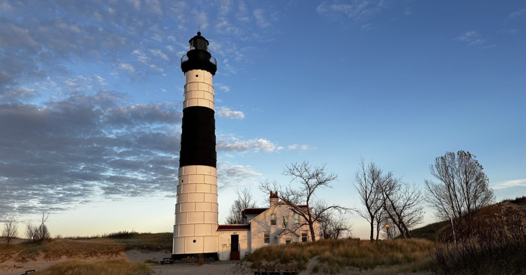 Big Sable Point Lighthouse on the sandy shore of Lake Michigan near Nordhouse Dunes.