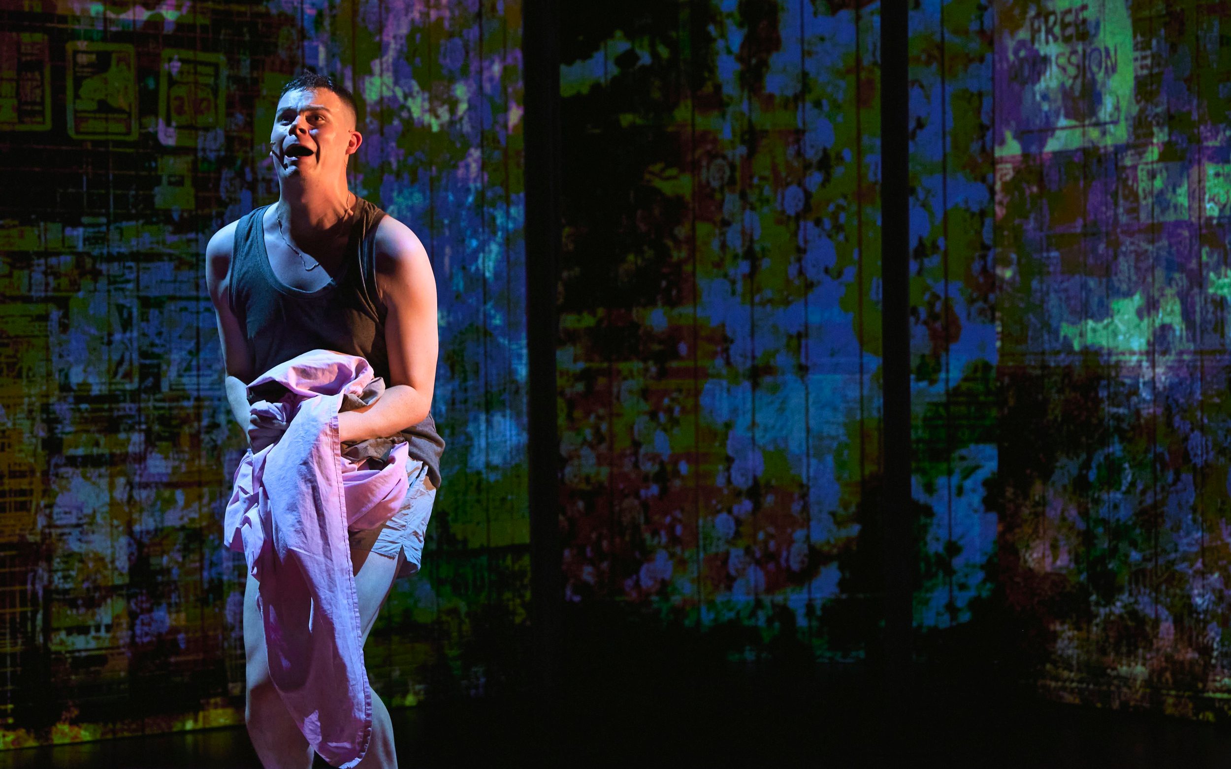Kieran Andrew as Spud, whose infamous encounter with soiled bed sheets loses much of its comic impact on stage