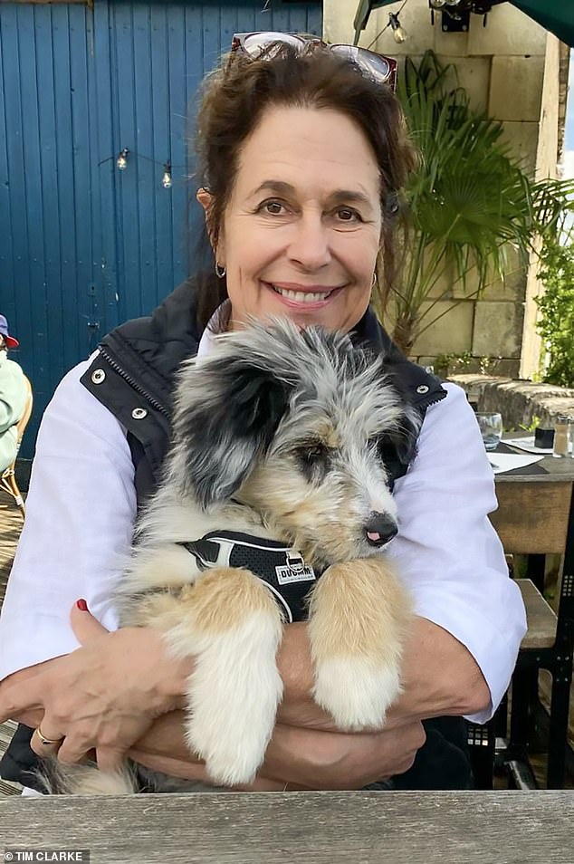 Two days before her murder, on her 65th birthday, Karen Carter (pictured) posed for what is believed to be her last ever photograph while out for lunch with friends