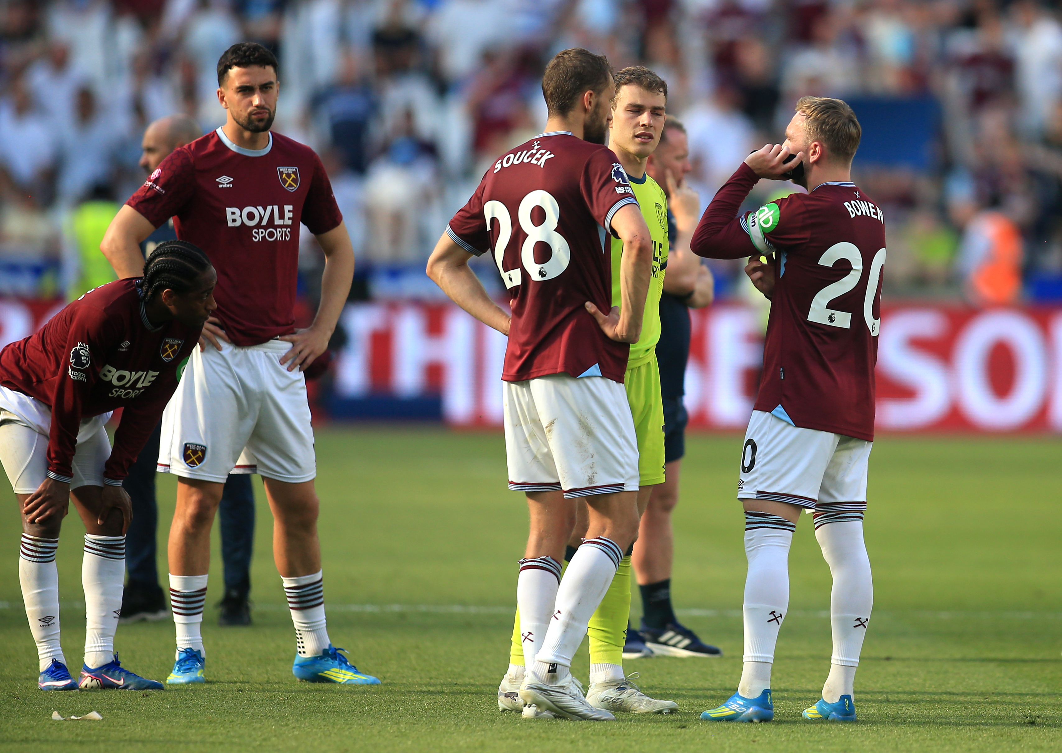 West Ham United players await other results after the final whistle in the Premier League match at the London Stadium (PA)