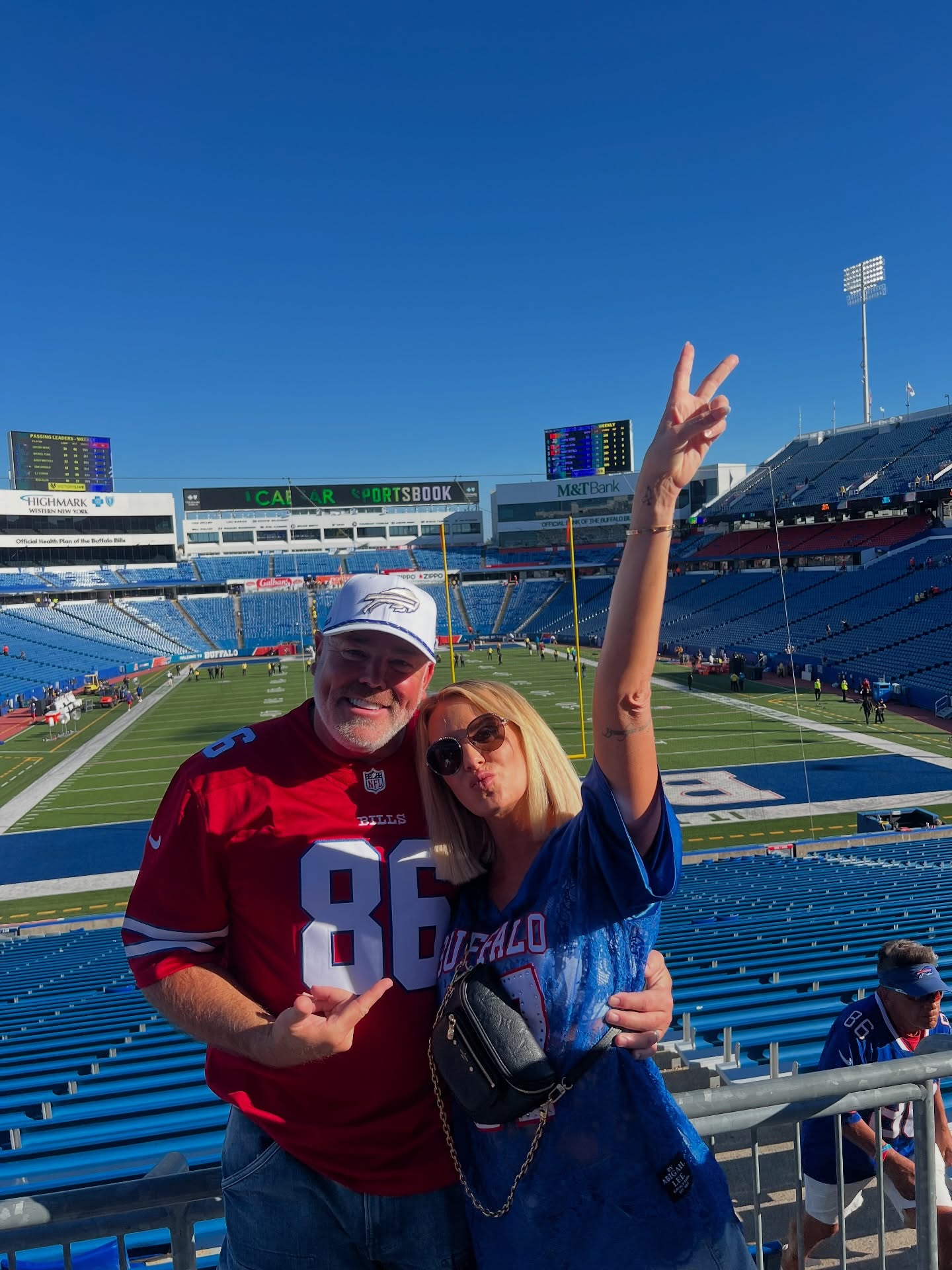 Whitney and Justin Rose at a Buffalo Bills football game.