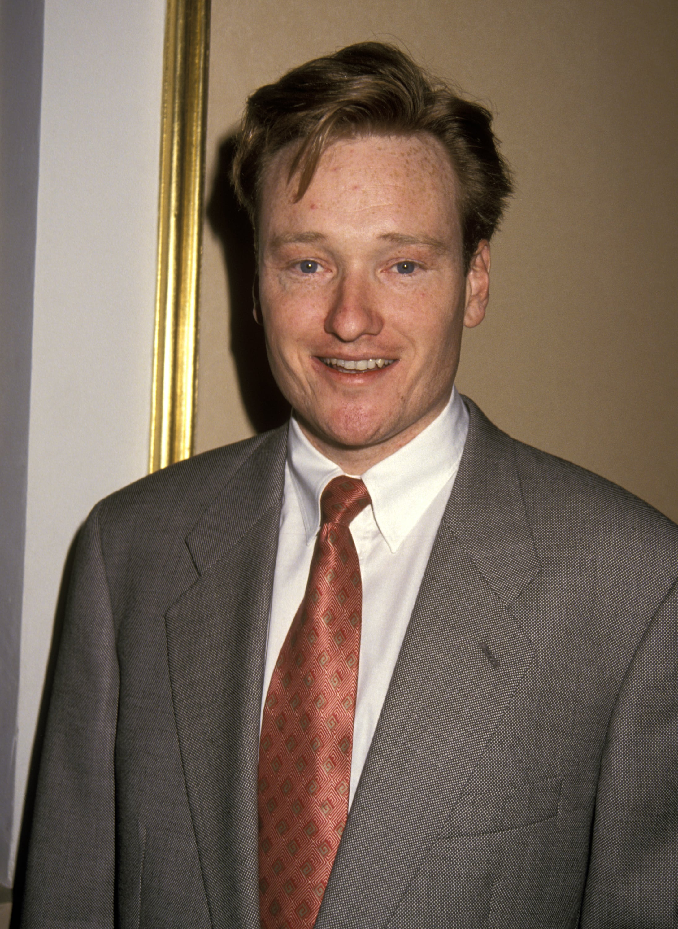 Conan O'Brien wears his trademark pompadour at the 1993 Center for Communication Awards Luncheon Honoring Johnny Carson at The Plaza Hotel in New York City. / Ron Galella / Ron Galella Collection via Getty