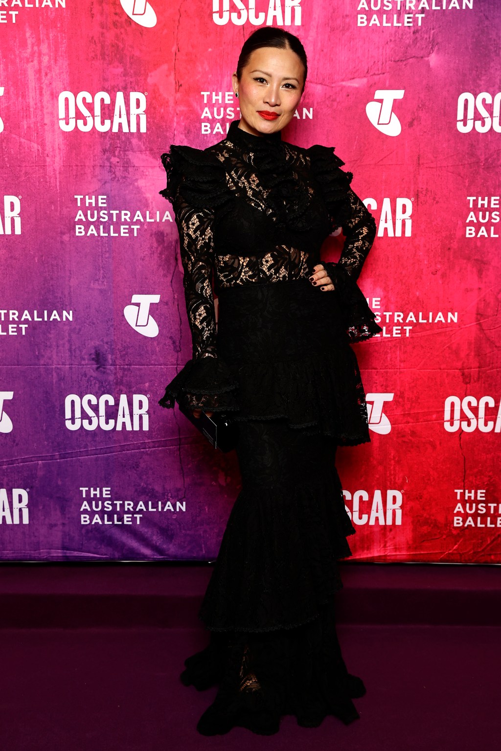 Poh Ling Yeow in a black lace dress at The Australian Ballet World Premiere of