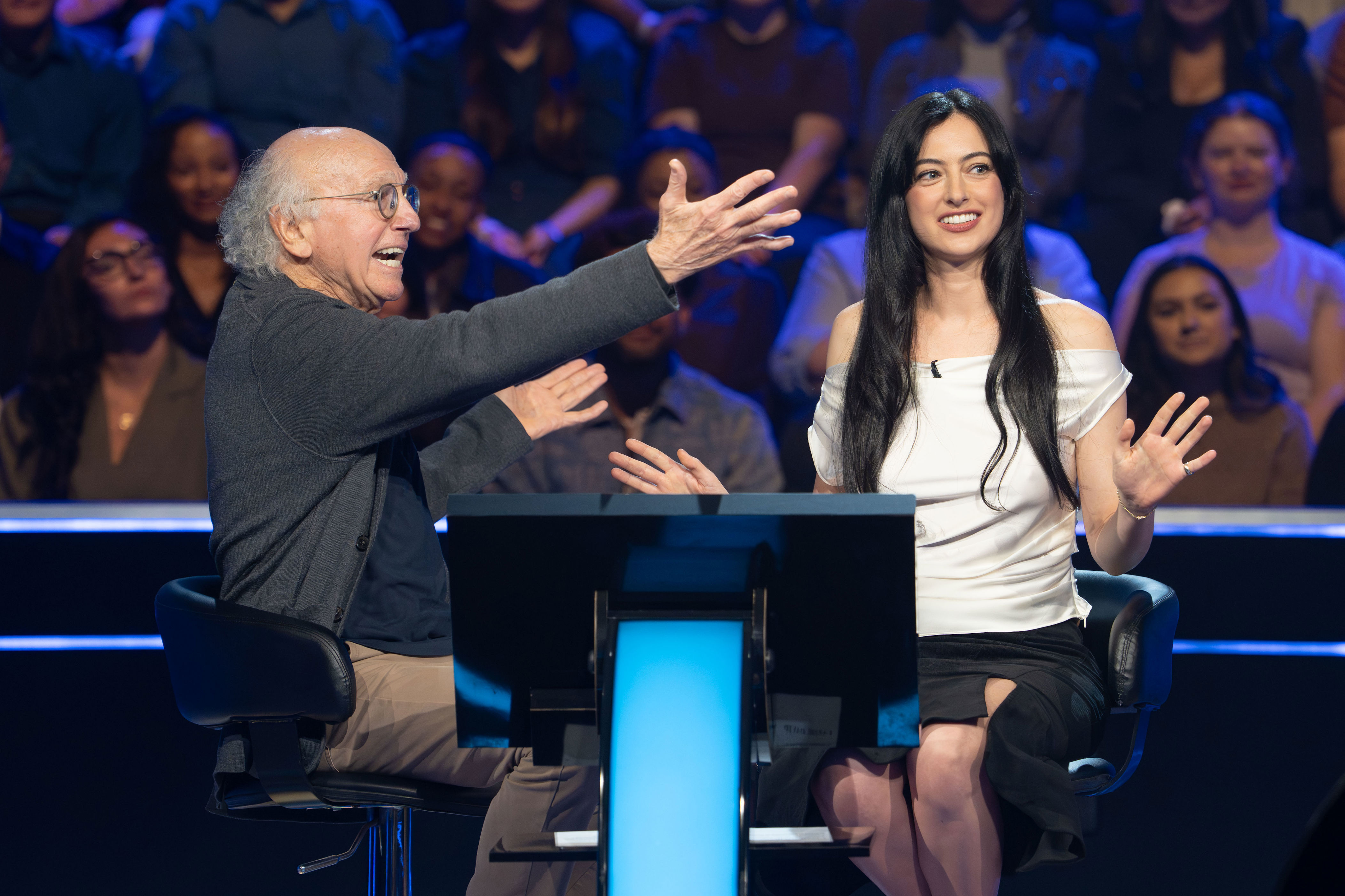 WHO WANTS TO BE A MILLIONAIRE? - “In The Hot Seat: Larry David & Cazzie David / Ben Affleck & Jamie Ding” - Larry David teams up with his daughter, Cazzie David, while Ben Affleck joins game show champion Jamie Ding, as the celebrity duos take the hot seat, test their trivia knowledge and compete to win up to $1 million for charity. WEDNESDAY, JULY 22 (8:00-9:01 p.m. EDT) on ABC. (Disney/Eric McCandless) LARRY DAVID, CAZZIE DAVID