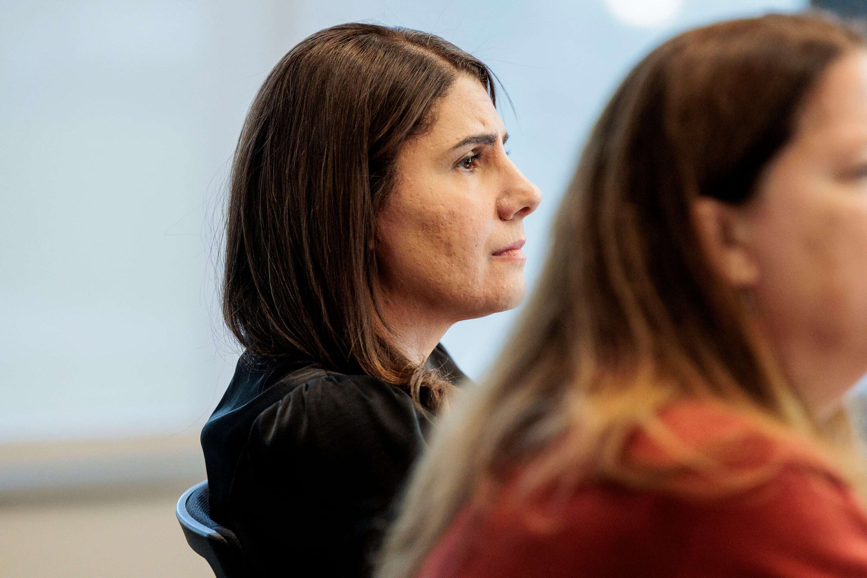 Ann Arbor Board of Education Trustee Rima Mohammad watches on during a meeting on Wednesday, June 3, 2026.