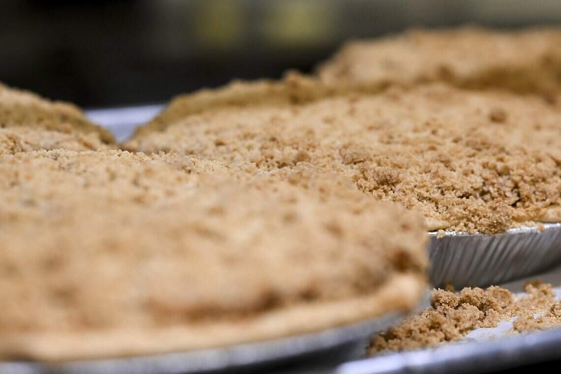Fresh Dutch apple pies rest on a rack after baking at Ikeda’s in Auburn on Sunday, July 19, 2026. Ikeda’s was recently named the #1 best pie shop in America according to USA Today.