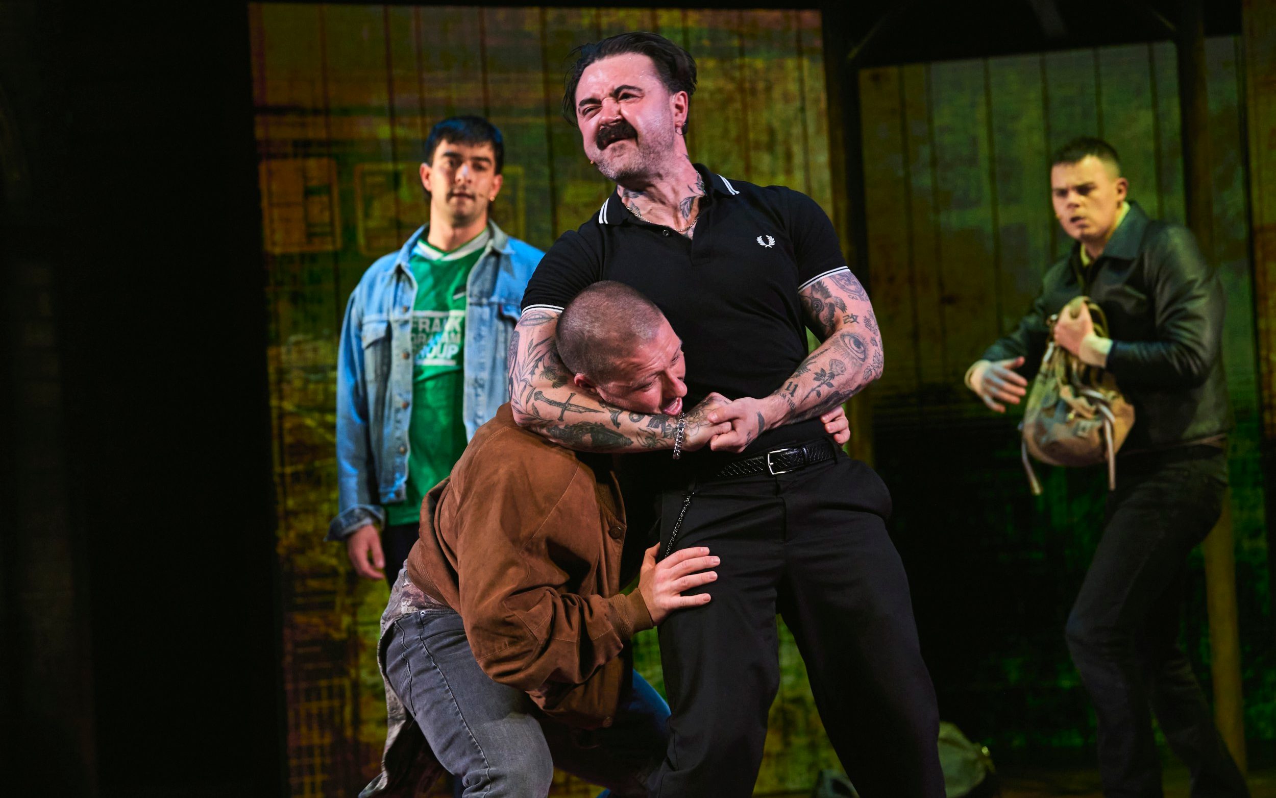 L-R: Finlay Paul (Tommy), Lewis Kidd (Renton), Frankie O'Connor (Franco Begbie) and Kieran Andrew (Spud) in Trainspotting: The Musical