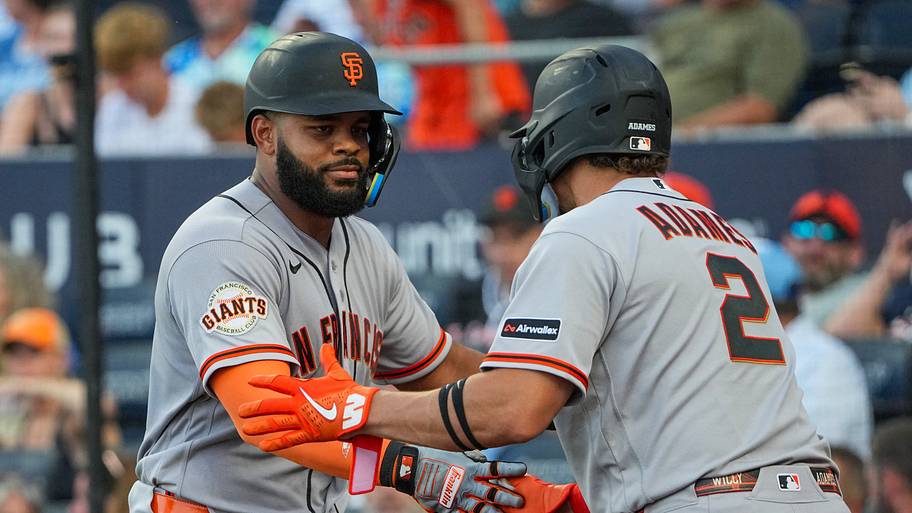 San Francisco Giants left fielder Heliot Ramos and shortstop Willy Adames