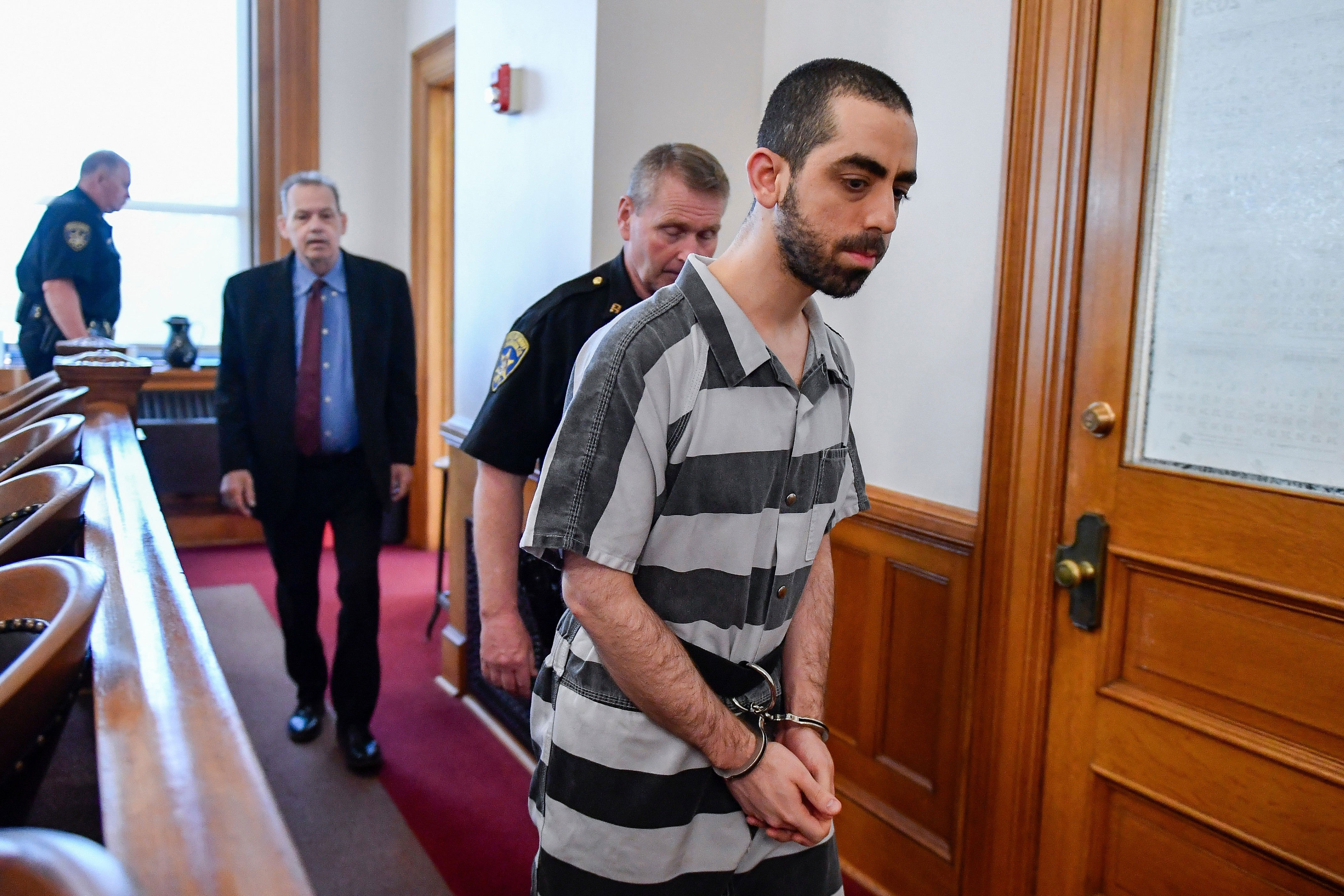 Prosecutors say Hadi Matar attacked the renowned author and free-speech advocate in 2022 to try to carry out a decades-old fatwa, or religious ruling (AP Photo/Adrian Kraus)