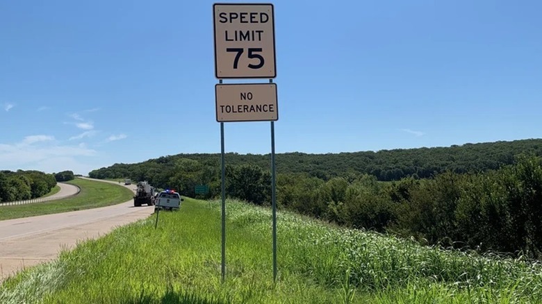 A sign warns drivers to keep their speed below 75 mph with the ominous warning of "no tolerance"