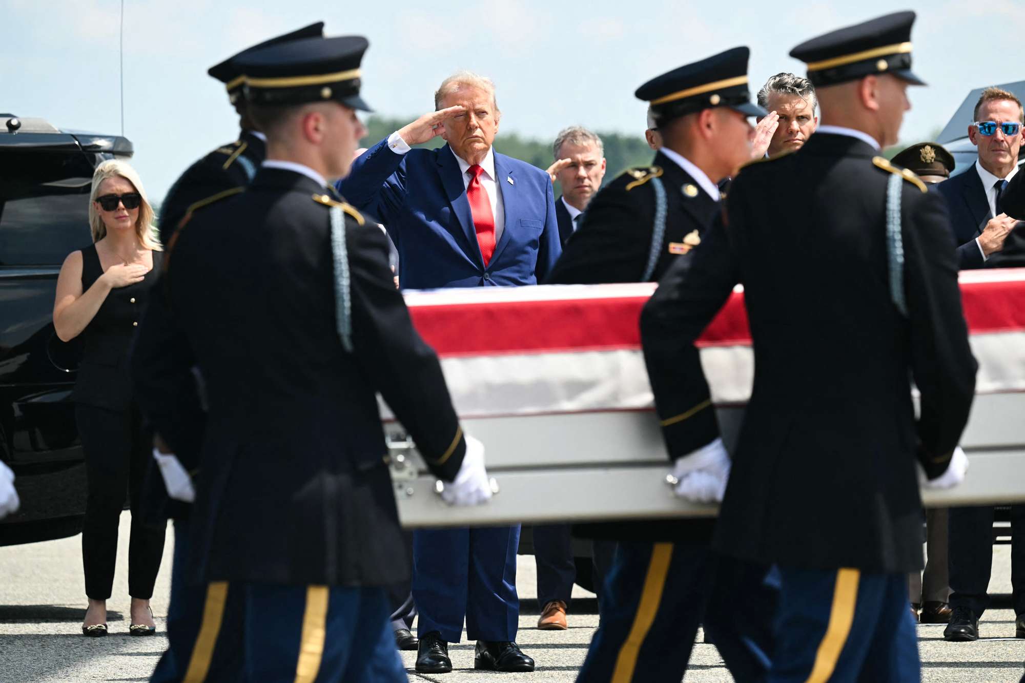 Trump attends dignified transfer of fallen soldiers after boasting that his Iran war has only killed 18 Americans