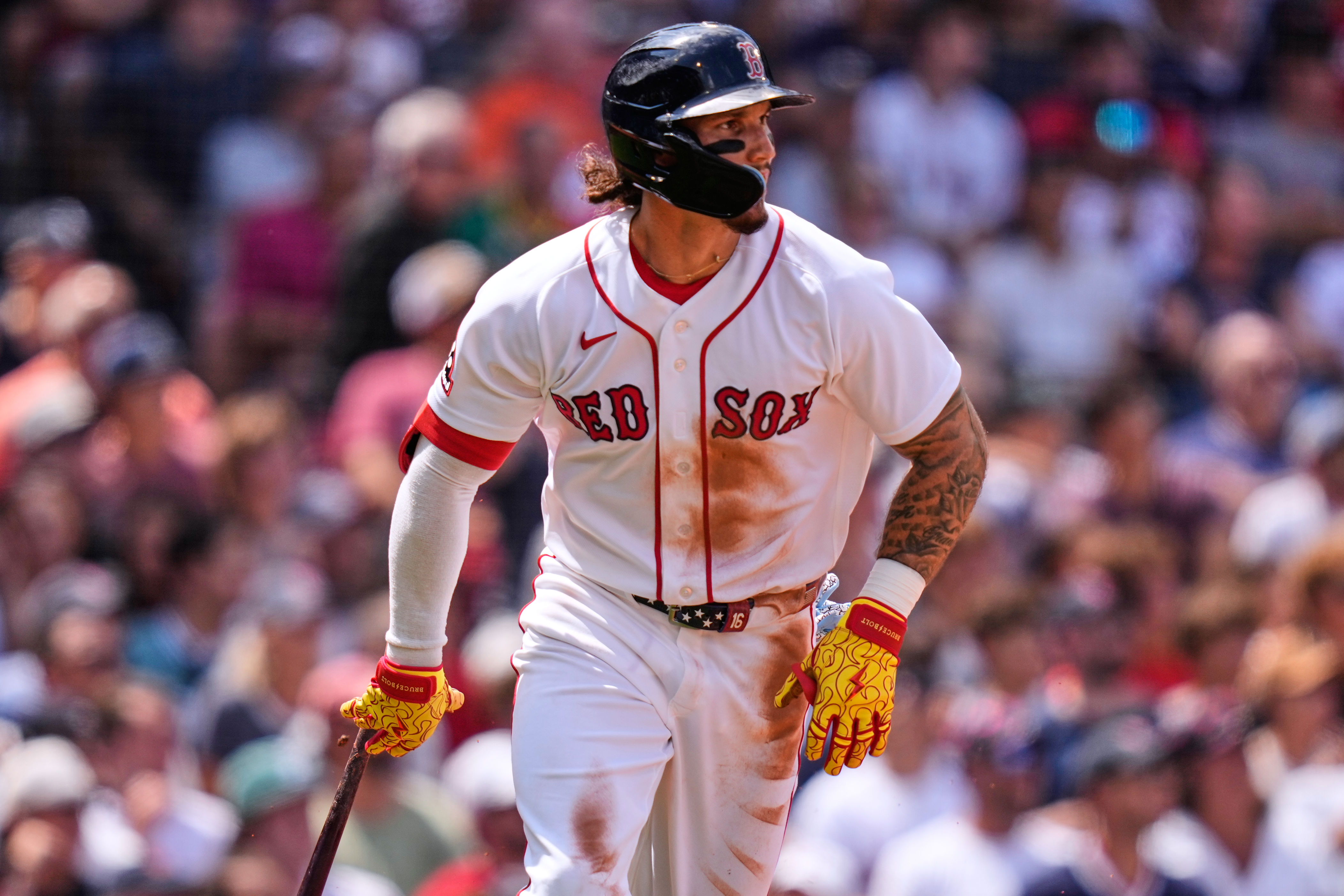 Boston Red Sox's Jarren Duran watches the flight of his sacrifice fly, which scored Caleb Durbin, in the third inning during the first baseball game of a doubleheader against the Baltimore Orioles, Wednesday, July 22, 2026, in Boston. (AP Photo/Charles Krupa)