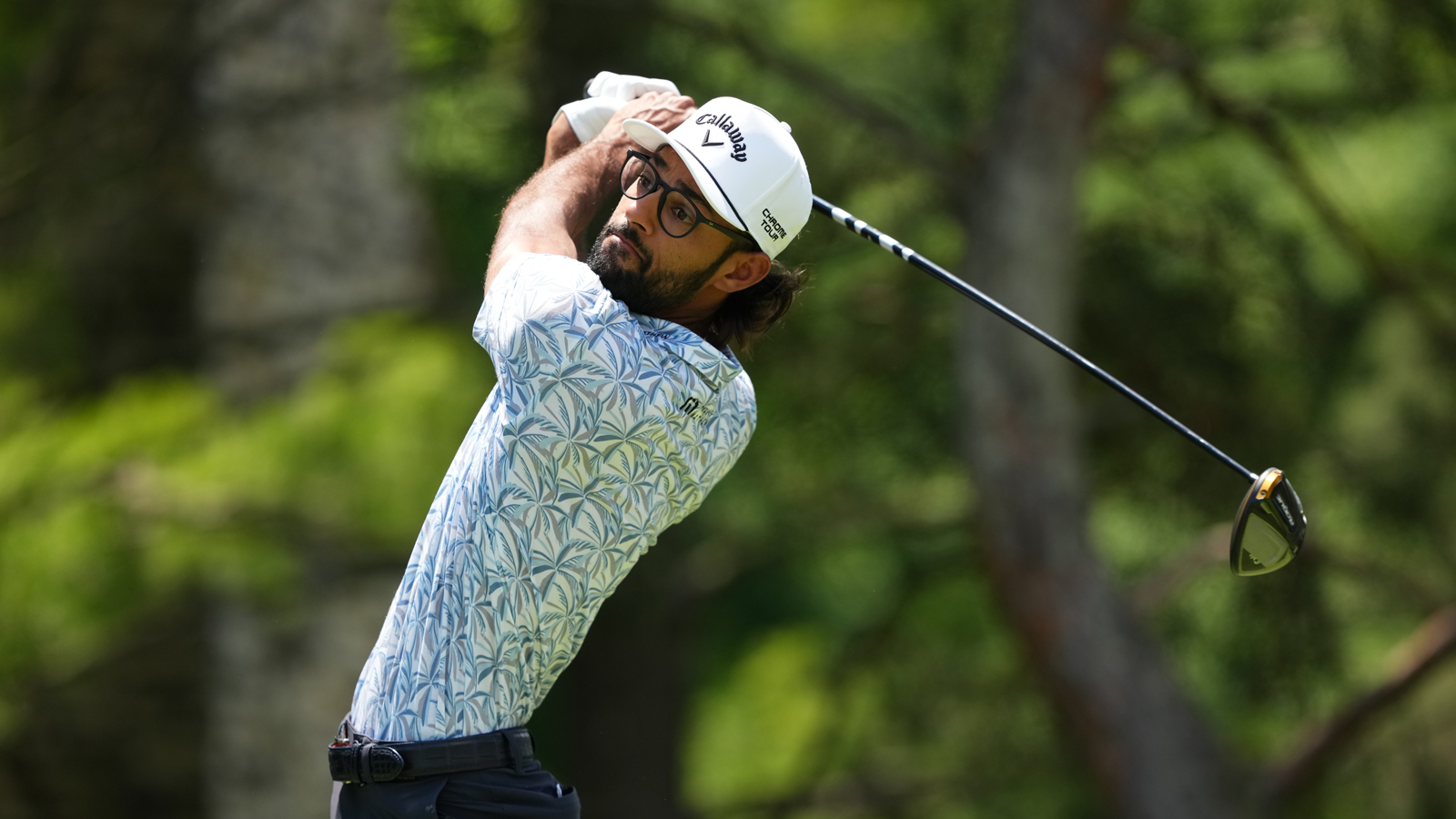 Akshay Bhatia hits a driver off the tee