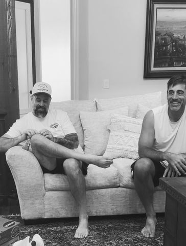 Aaron Rodgers with his brother Luke