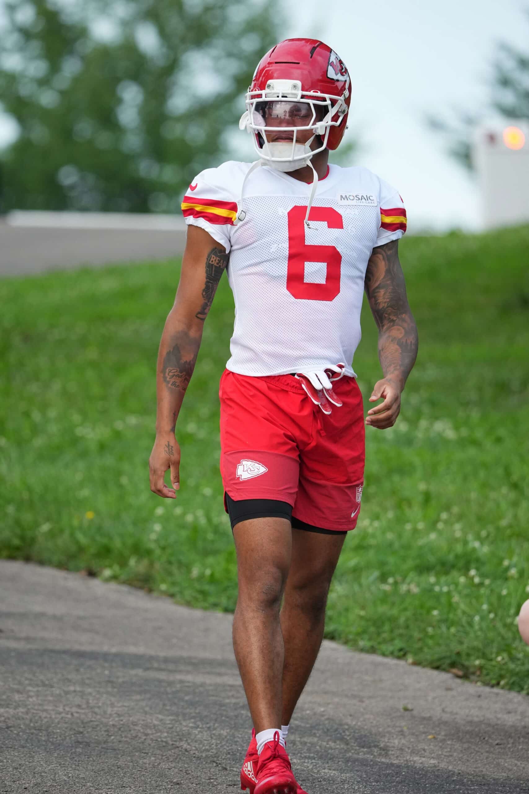 Jul 22, 2025; St. Joseph, MO, USA; Kansas City Chiefs safety Bryan Cook (6) walks down the hill to the practice fields during training camp at Missouri Western State University. Mandatory Credit: Denny Medley-Imagn Images