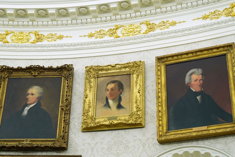 The video, set to triumphant music, showcases all the golden additions and portraits of former presidents lining the walls of the historic office.