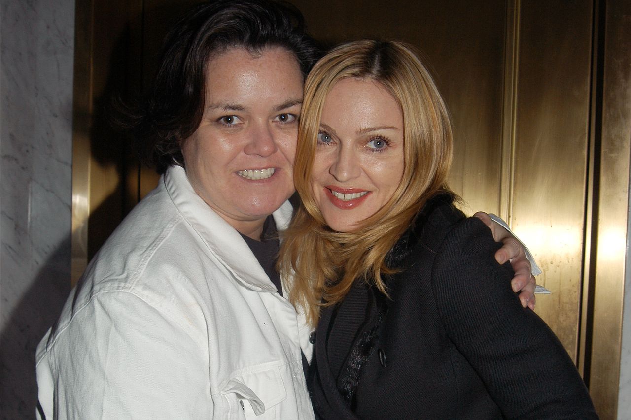 Rosie ODonnell and Madonna smiling and posing together embraced