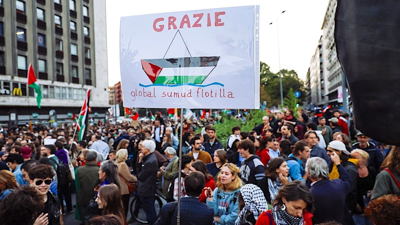 Demonstrators gather during a protest supporting the Global Sumud Flotilla in Milan.