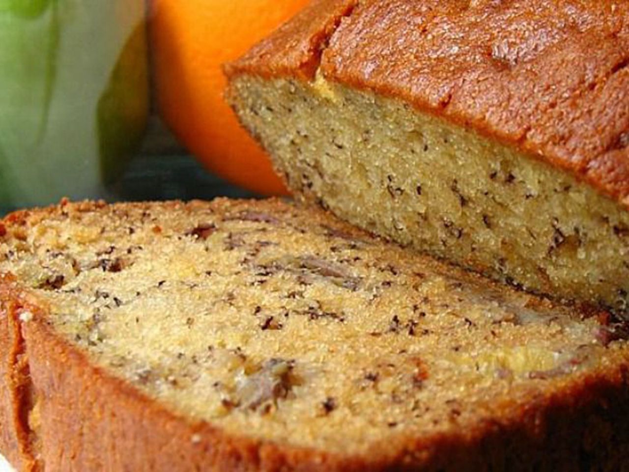 close up of sliced Janet's rich banana bread with walnuts