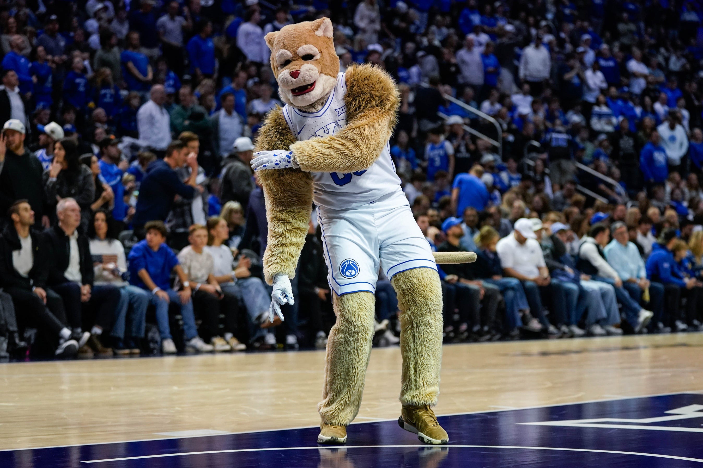 Jan 14, 2026; Provo, Utah, USA; BYU mascot Cosmo the Cougar performs during a stoppage during the first half against the TCU Horned Frogs at Marriott Center. Mandatory Credit: Aaron Baker-Imagn Images