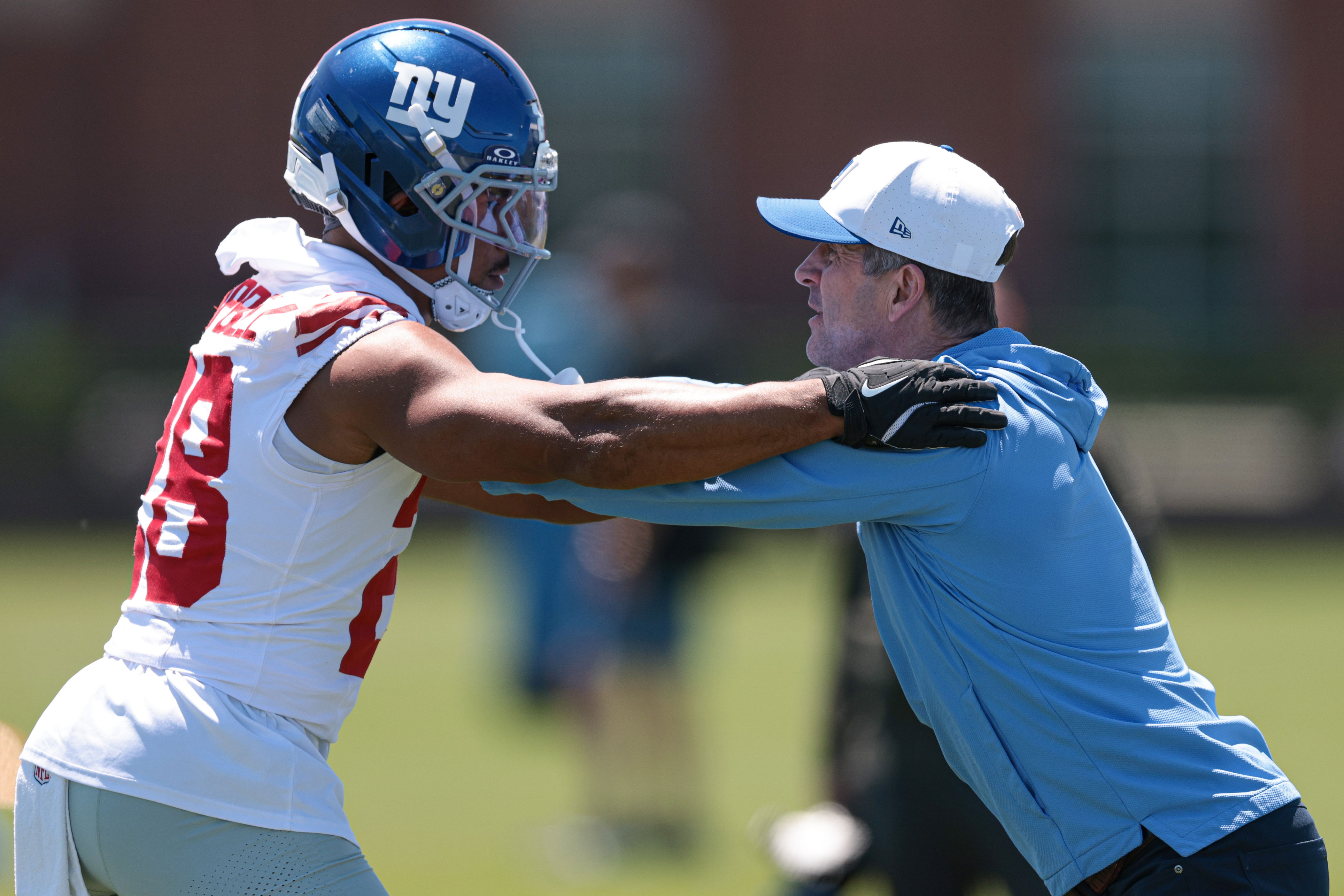 John Harbaugh’s awkwardness rubs New York Giants fans the wrong way