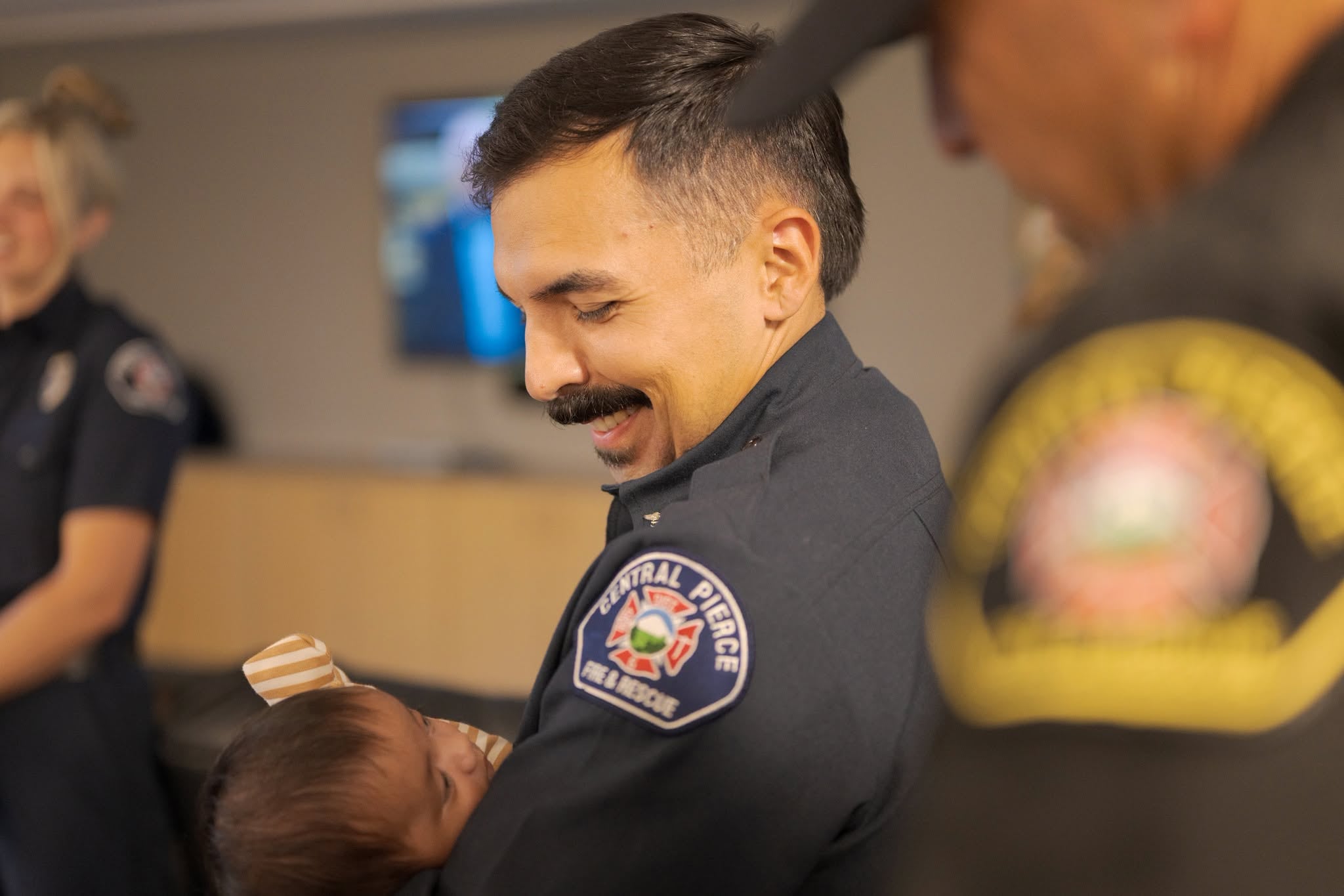 Central Pierce firefighters reunite with newborn they saved