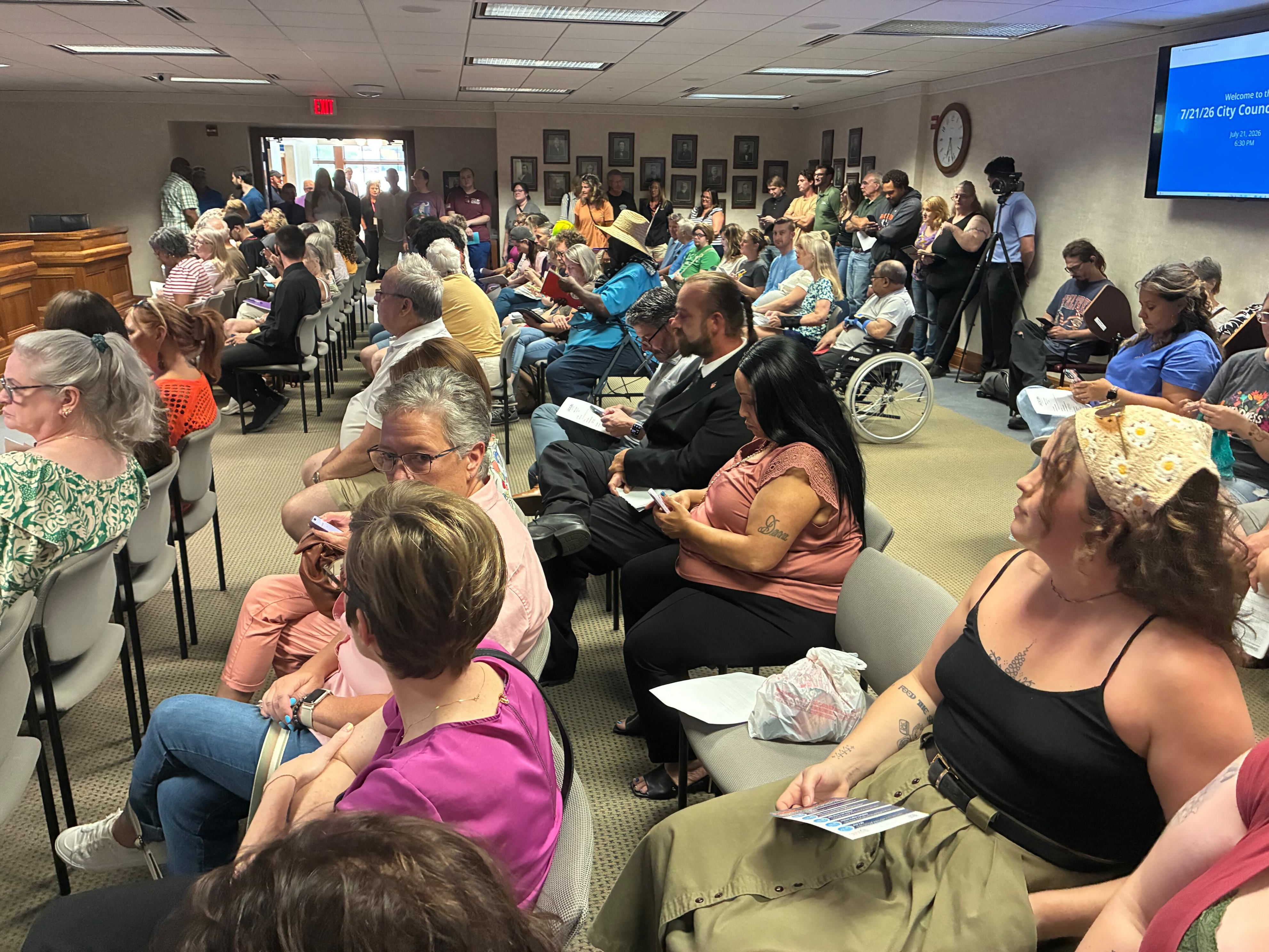 People fill the Jackson City Council chambers in downtown Jackson as the council considers an ordinance that would limit and allow for the removal of property in public spaces.