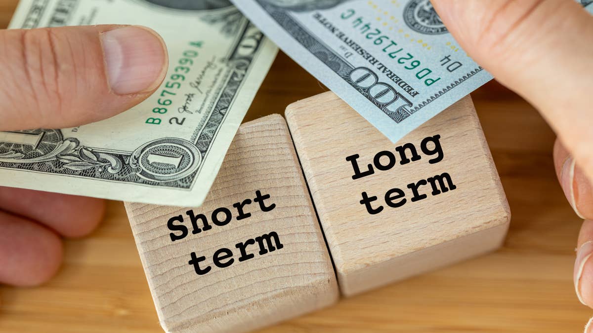 long-term-and-short-term-profits-business-concept-long-term-strategy-yields-more-profit-one-dollar-bill-as-short-term-profit-and-100-dollars-as-a-symbol-of-prospective-growth