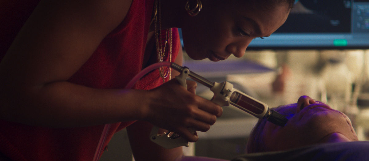 NAOMI ACKIE as Caitlyn Corr and TOM RHYS HARRIES as Matt Hagen