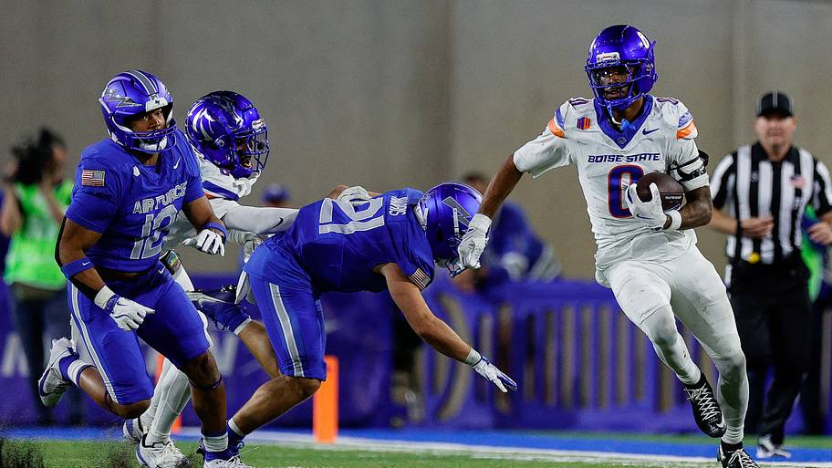 Ty Benefield runs back an interception against Air Force in 2025