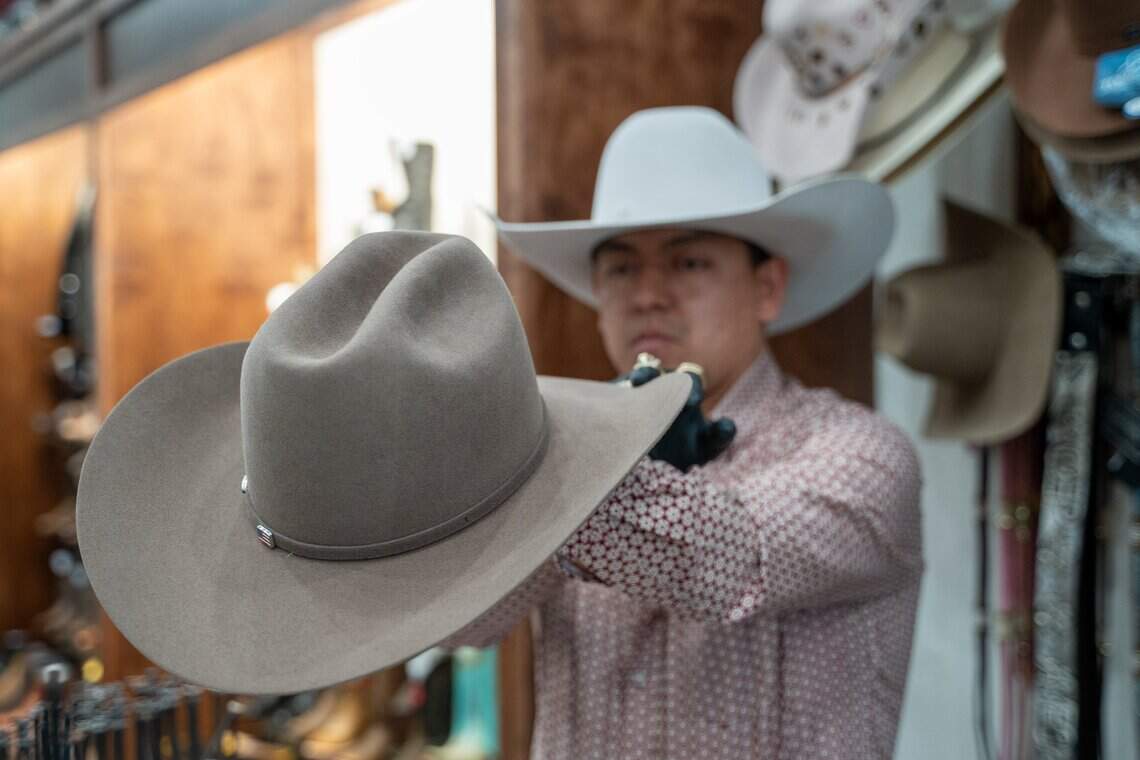 Salinas Charreria & Western Wear owner Chirstian Salinas finishes a hat for a customer on Tuesday, Jan. 27, 2026. Salinas Charreria & Western Wear opened its San Luis Obispo location Jan. 3.