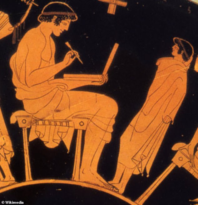 Other images from Ancient Greece around 500 BC appeared to show scholars using a laptop and stylus, although the objects have been dismissed as wax tablets