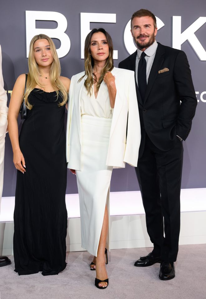 Harper Beckham, Victoria Beckham, and David Beckham attend the 'Victoria Beckham' premiere at the Curzon Mayfair on October 8, 2025 in London, England.