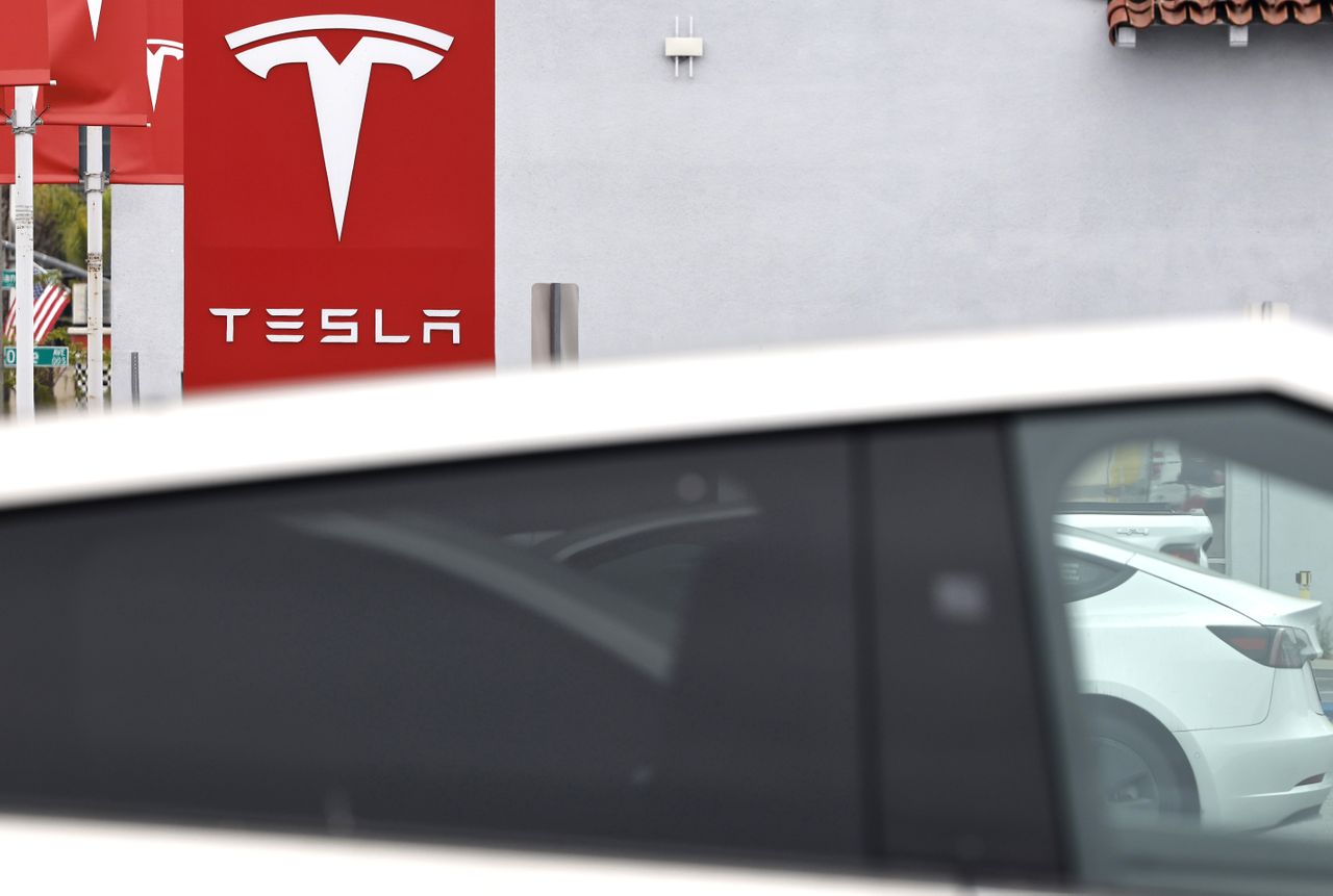 The Tesla logo is displayed at a Tesla dealership on July 2, 2026 in Alhambra, California