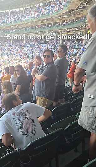 After the slap, other fans in the section appeared to take exception to the violent action