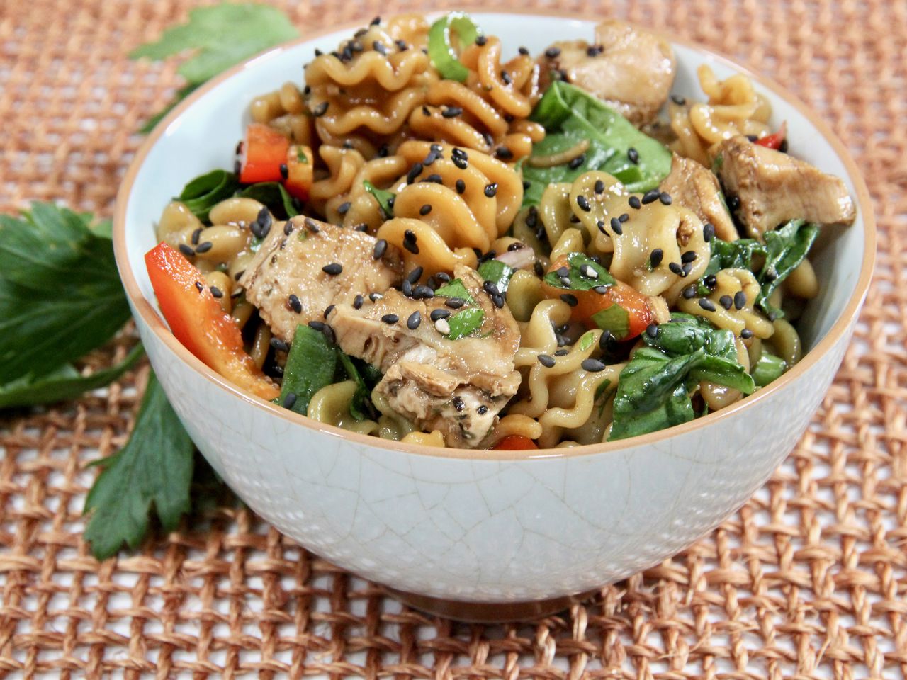 Chicken pasta salad with sesame seeds and fussili pasta