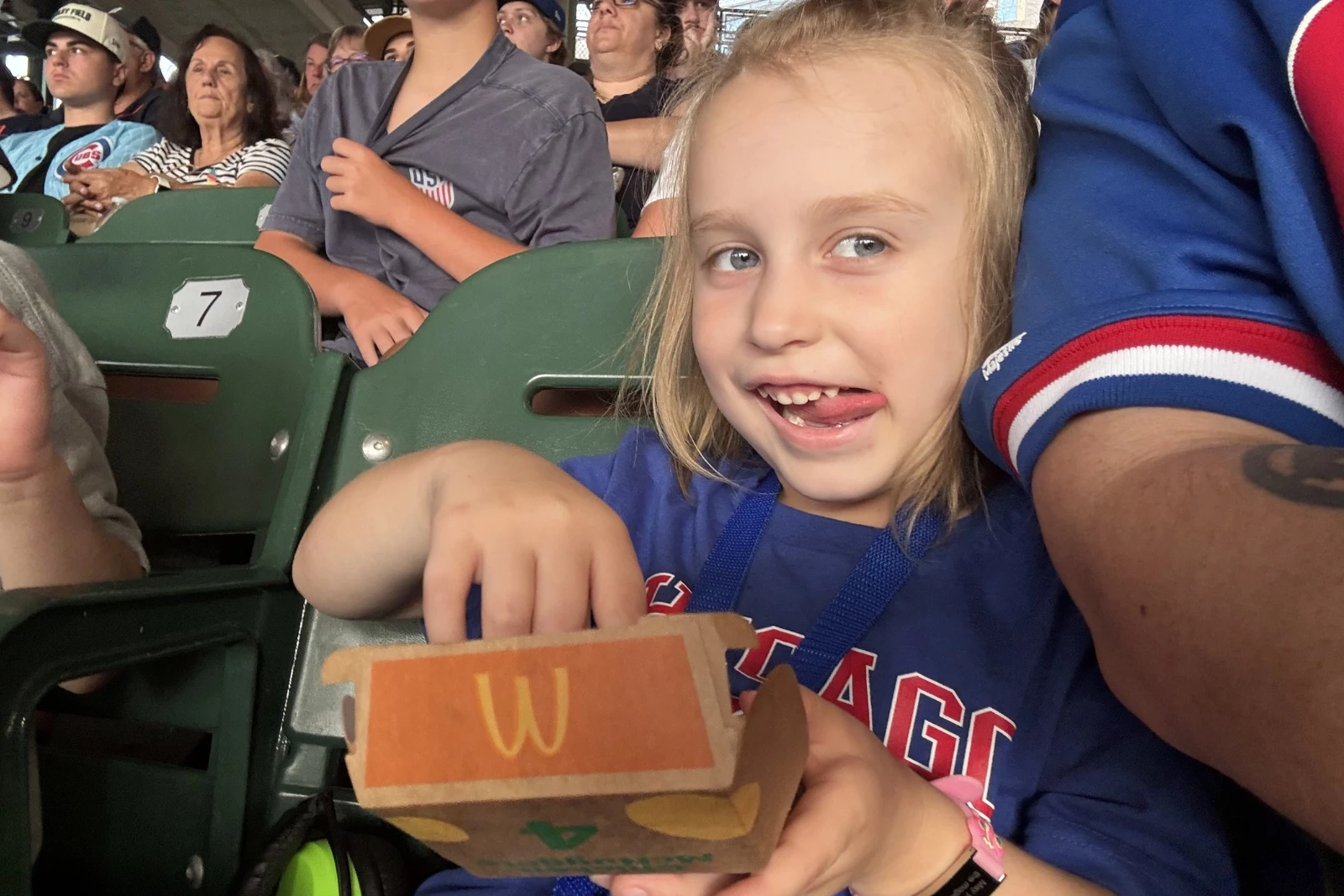 child eating mcdonalds wrigley field
